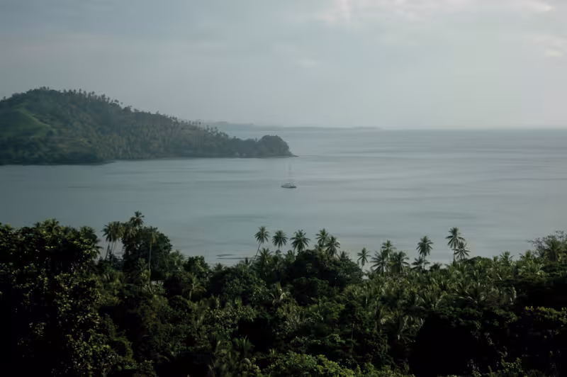 Jangada, anchored in Tagula Island’s huge lagoon, Louisiades Archipelago.  