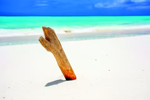 The ultimate white sand. It’s the kind that burns your retinas like snow, with the added bonus of an incredible contrast between sky and sea.