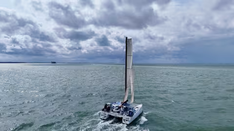 This view clearly shows the significant volume offered by the hulls. Note that the central cockpit is so large that it can readily accommodate the dinghy!