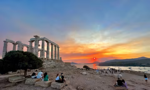 Standing almost 200 feet (60 m) above the Aegean Sea, the Temple of Poseidon at Cape Sounion was built in the 5th century BC. Our powercat is anchored directly below the monument...