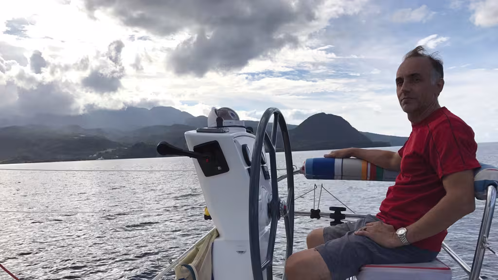 Greg, a happy sailor who has realized his dream by chartering rather than buying!