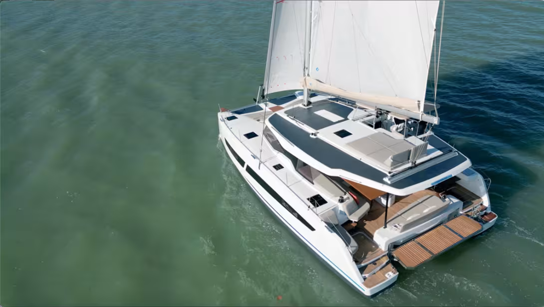 This view highlights the large area reserved for solar panels; note also the large aft platform equipped with tilting cradles. It can be lowered 12-16 inches (30-40 cm) below the waterline.