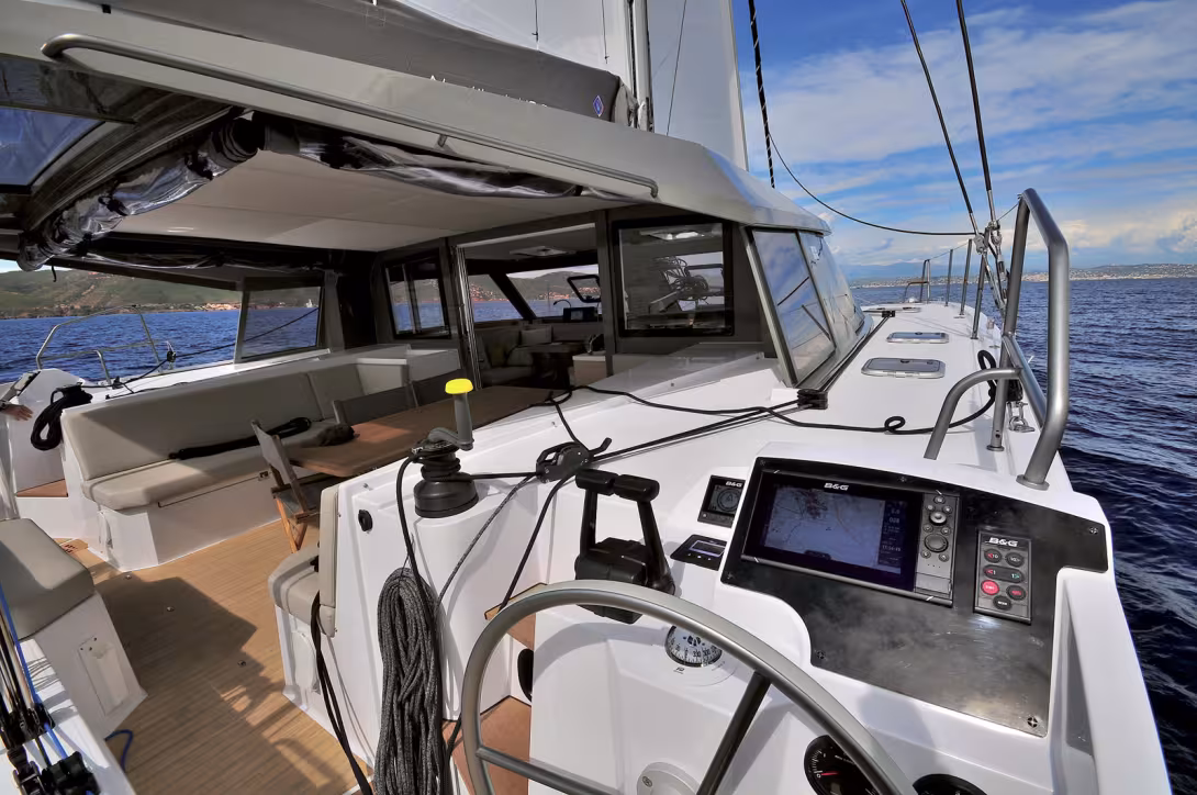 Helm stations out on the hulls?  You either love them or hate them…