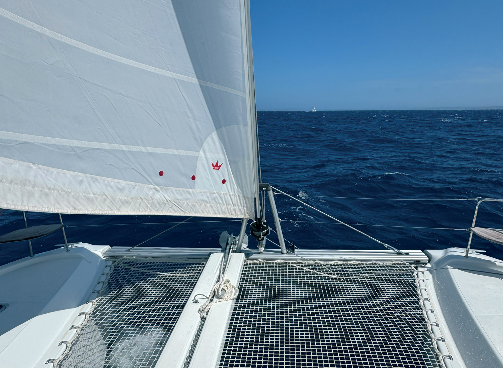 The chain lead - like the bow roller and the windlass - is offset to port, creating one large and one small trampoline...
