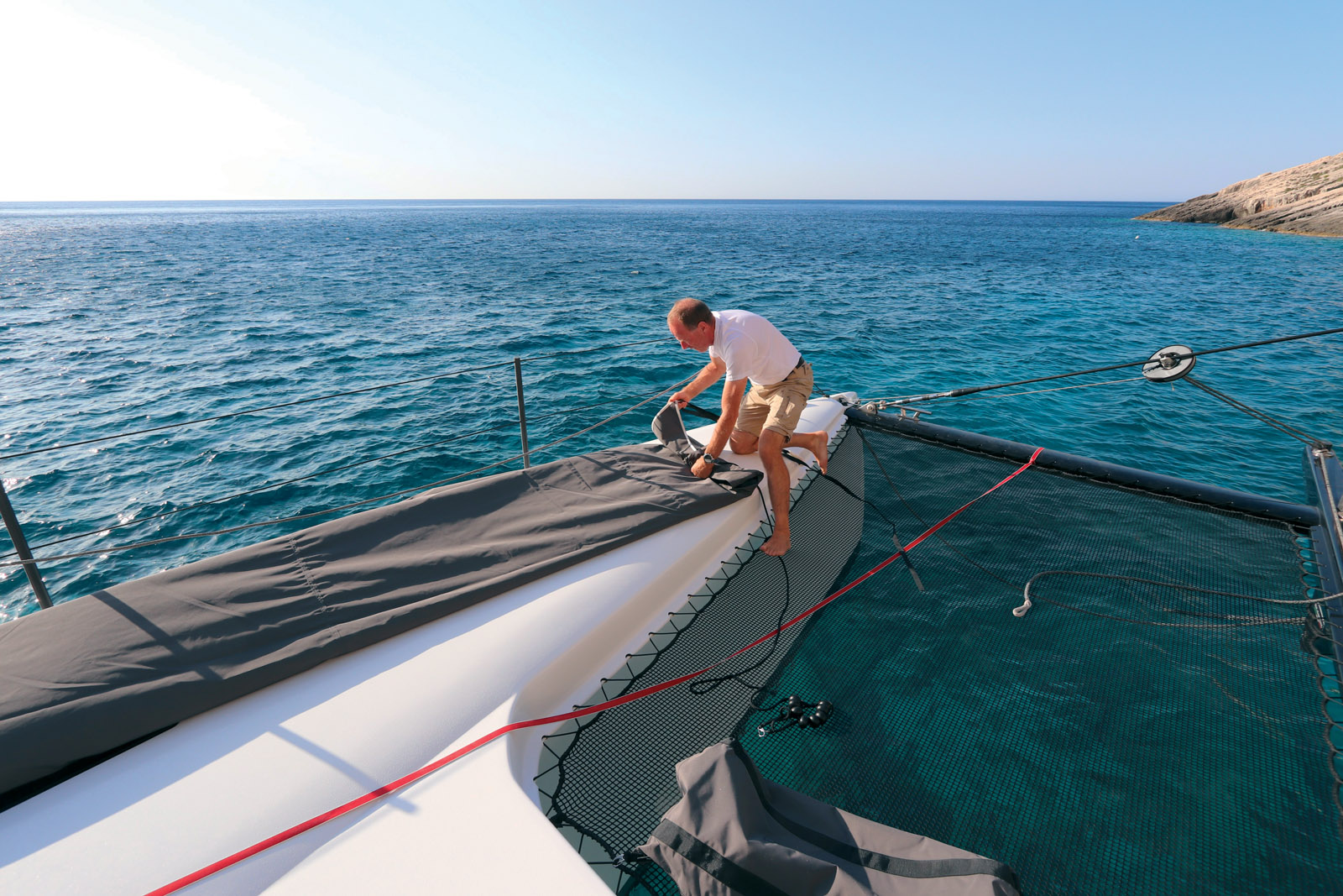 Taken out of its storage bag, the Canopée is unrolled on the deck.