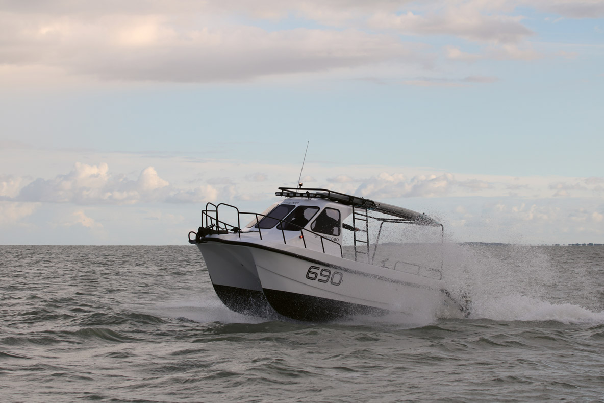 small power catamaran with cabin